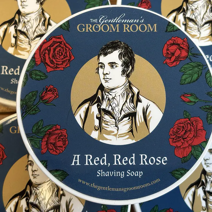 A Red, Red Rose shaving soap was inspired by our national poet “Rabbie” Burns. The Gentleman’s  Groom Room owner passes a statue of Burns every day on the way to the store.  The statue is by Sir John Robert Steell, the eminent Victorian sculptor and was unveiled in Dundee, Scotland in 1880, just two weeks after the first one was unveiled in Central Park, New York, USA. For his sculpture Steell closely followed the portrait of Robert Burns painted by Alexander Nasmyth in 1787. Two other casts were later commissioned for the statue in London, England (1884) and Dunedin, New Zealand (1887). This fabulous fragrance has top notes of RED ROSE, pink rose, and geranium, a middle of grass on a base of wood and spice.